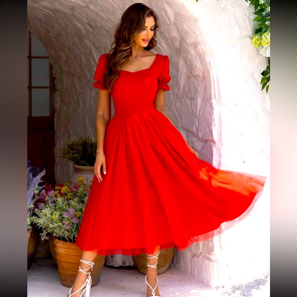 Red dress with sleeves and A line shape